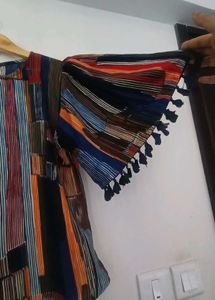Vibrant Striped Blouse with Tassel Trim
