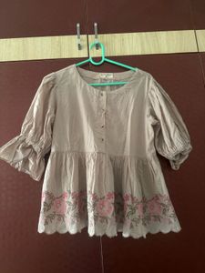 Embroidered Peplum Blouse