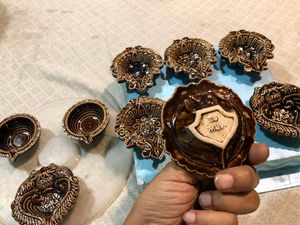 Set of New 9 ceramic designer diyas together.