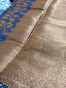 Elegant Blue Saree with Golden Leaf Motifs