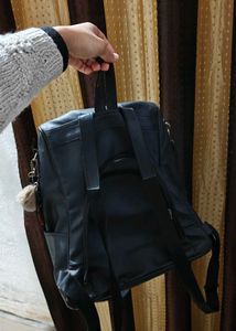 Stylish Black Backpack with Charm