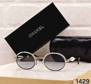 Chanel Round Sunglasses with Pearl Detail