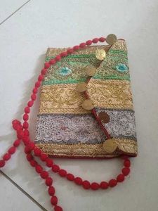 Embroidered Clutch with Coin Detail