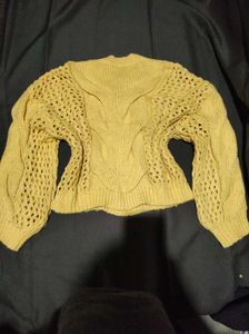 Yellow knitted sweater