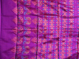 Vibrant Purple Silk Saree with Peacock Motif