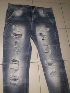 Distressed Blue Denim Jeans