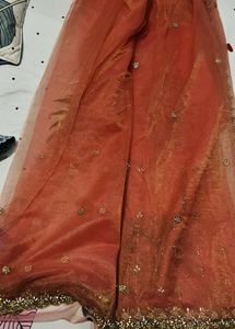 Sequins and hand stiched Net Saree with blouse pie