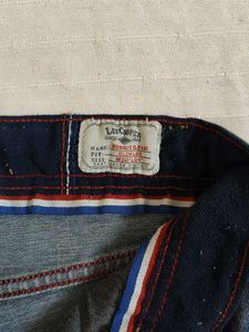 Distressed Blue Denim Jeans
