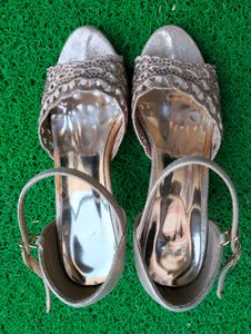 Golden Colour Beautiful Heel And Suit