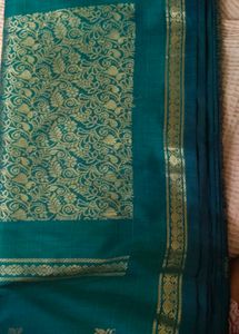 Beautiful Peacock blue Saree with Golden Border