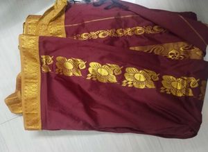 Elegant Maroon & Golden Saree
