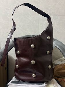 Chic Brown Leather Shoulder Bag with Silver Studs