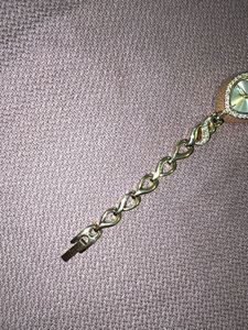 Elegant Gold Tone Watch with Rhinestones