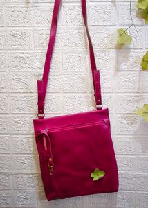 leather cut out sling bag