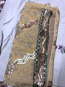 Elegant Cream Saree with Embellished Border