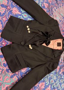 Chic Black Blazer with Bow Detail