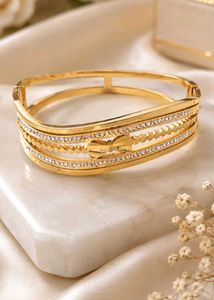 Elegant Gold Tone Bracelet with Crystals