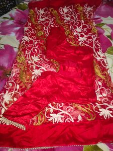Net embroidery red saree with stitched blouse