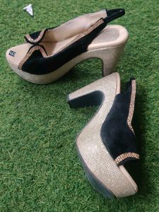 Black And Golden Heels
