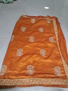 Elegant Orange Embroidered Saree