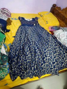 Blue Gown With Flowers Design