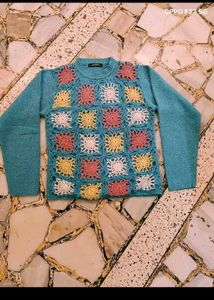 27. Crocheted Granny Square Sweater