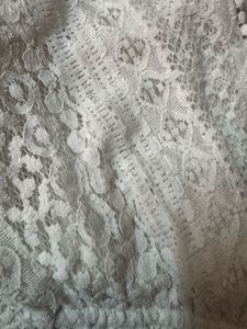 Elegant White Lace Peplum Top