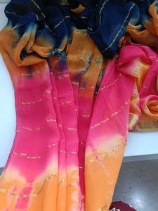 Vibrant Tie-Dye Saree with Gold Accents