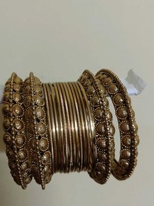 Peacock jhumka with golden bangles