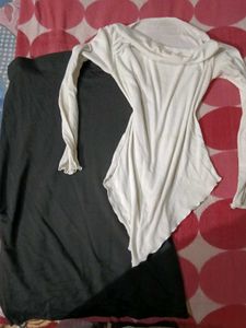 asymmetrical top and black skirt outfit