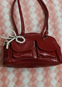 Red Handbag with Pearl Detail