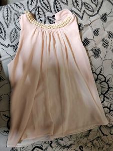 Pink Top with Cut-Out Detail