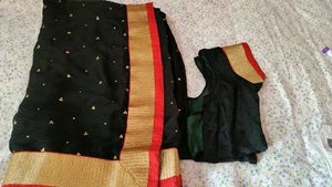 Elegant Black Saree with Gold Border