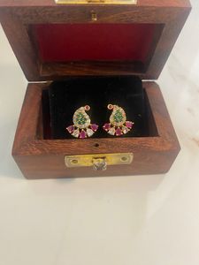 ad stone covering earrings
