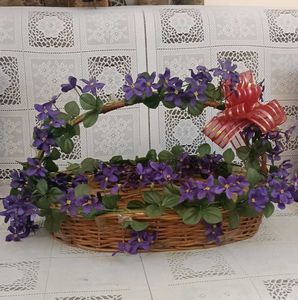 2. DECORATIVE BASKET WITH FLOWERS