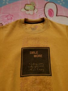 yellow sweatshirt