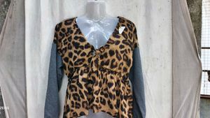 46209. Leopard Print Peplum Top