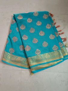 Beautiful Teal Saree with Gold Border