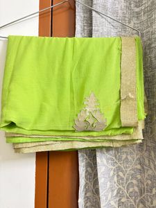 Vibrant Green Saree with Golden Border