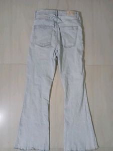 BERSHKA -Light Wash Blue Flared Jeans