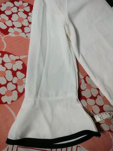 Elegant White Blouse with Black Trim