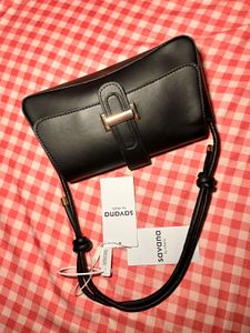Chic Black Shoulder Bag with Charm