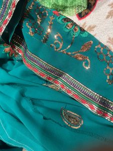 Elegant Teal Embroidered Saree unused