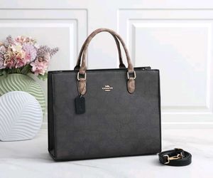 COACH**12A QUALITY HANDBAG* AT OFFER PRICE