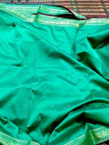 Elegant Teal Saree with Gold Border