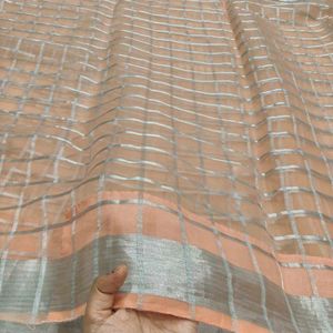 peach colour organza saree with designer blouse
