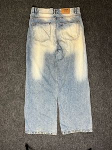 lite used blue baggy jeans