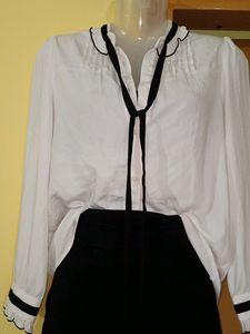 Classic White Blouse with Black Accents