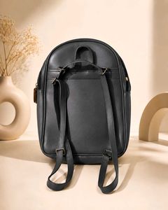 Sleek Black Faux Leather Backpack