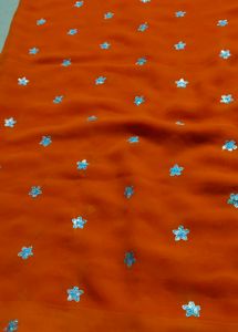 Orange Saree with Star Motifs and Blouse